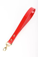 Roja Flogger in red patent leather with chain detailing by Fraulein Kink